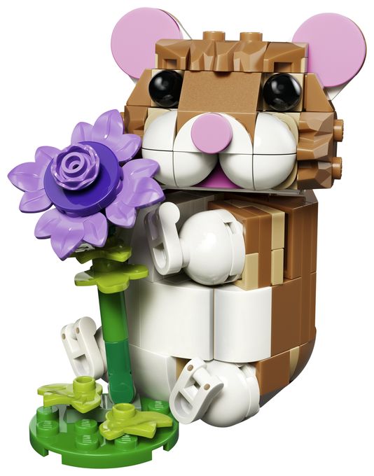 Niedlicher Hamster mit Blume 